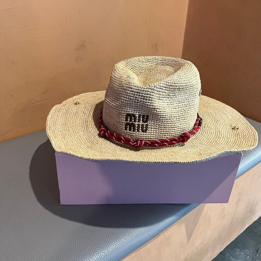 Miu Miu Women's Elegant Beige Straw Hat with Striking Red Bow